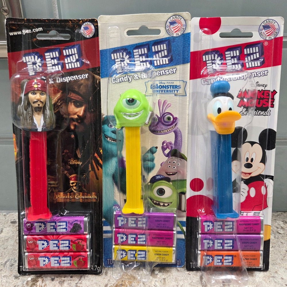 3 Disney PEZ Candy Dispensers Jack Sparrow Mike Wazowski Donald Duck New Sealed